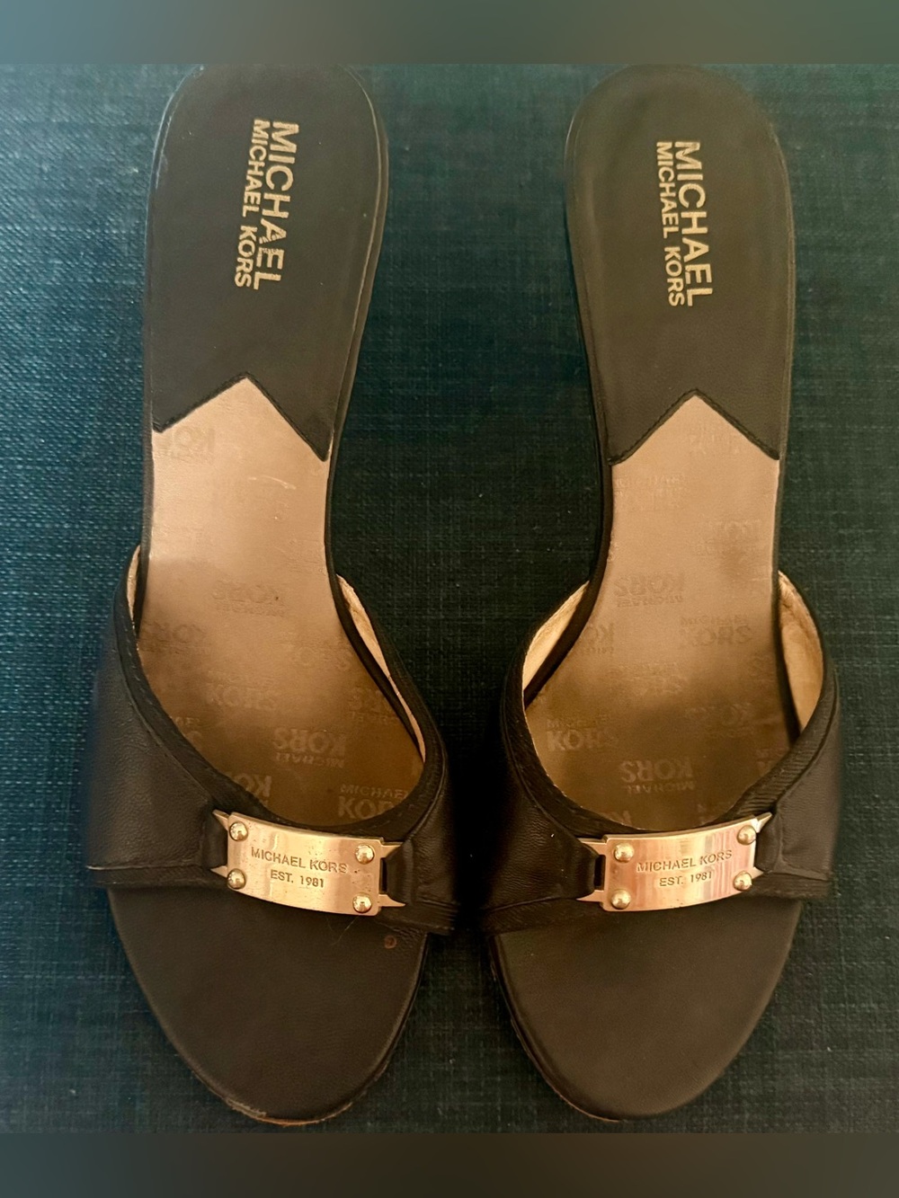 Michael Kors Black Leather 3” Slip-On Mules with Gold Plaque